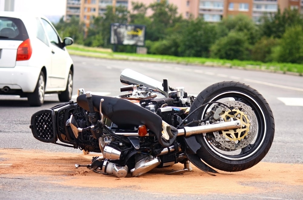 Scene of a highway Texas motorcycle accident showing a fallen bike.